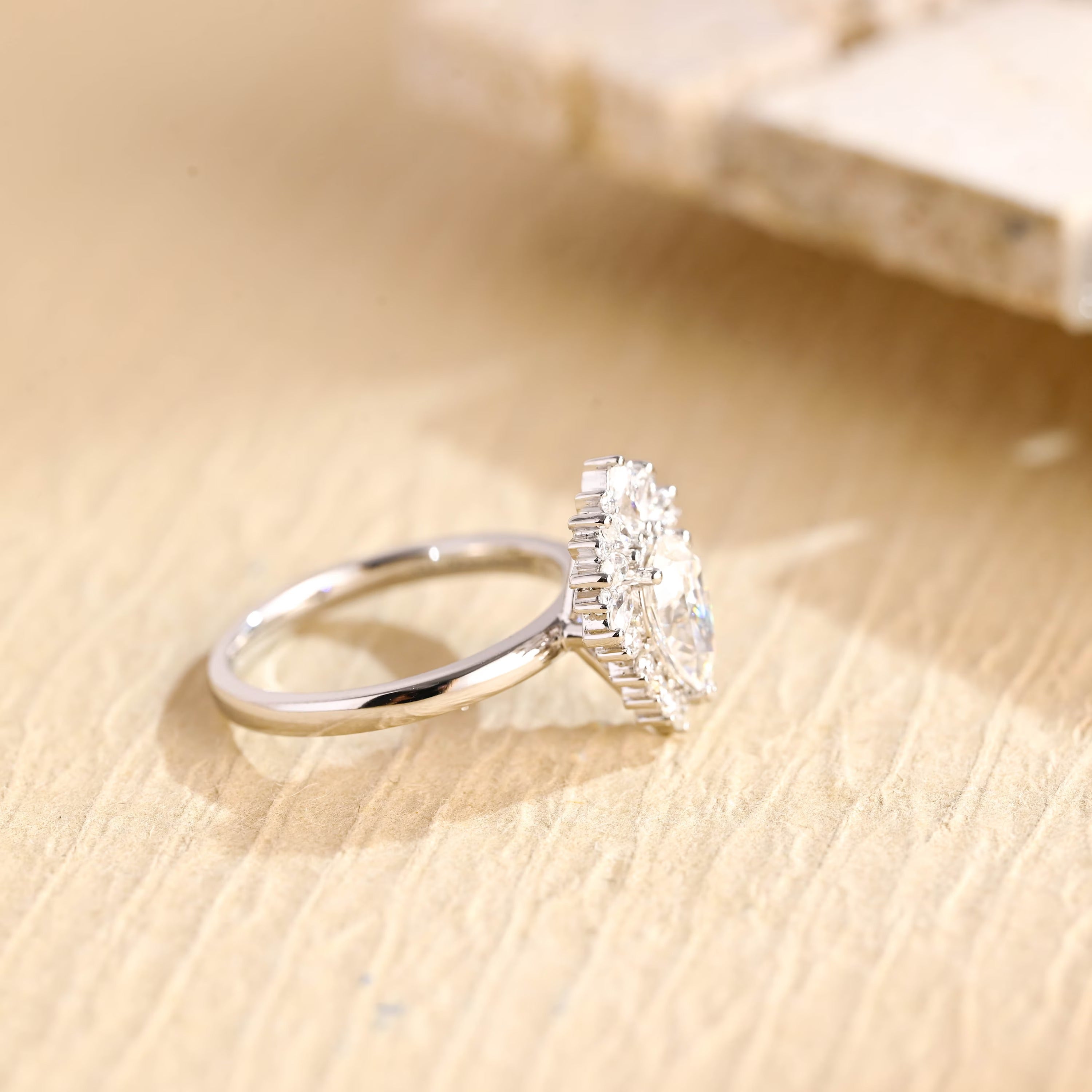 modern pear cluster engagement ring moissanite
