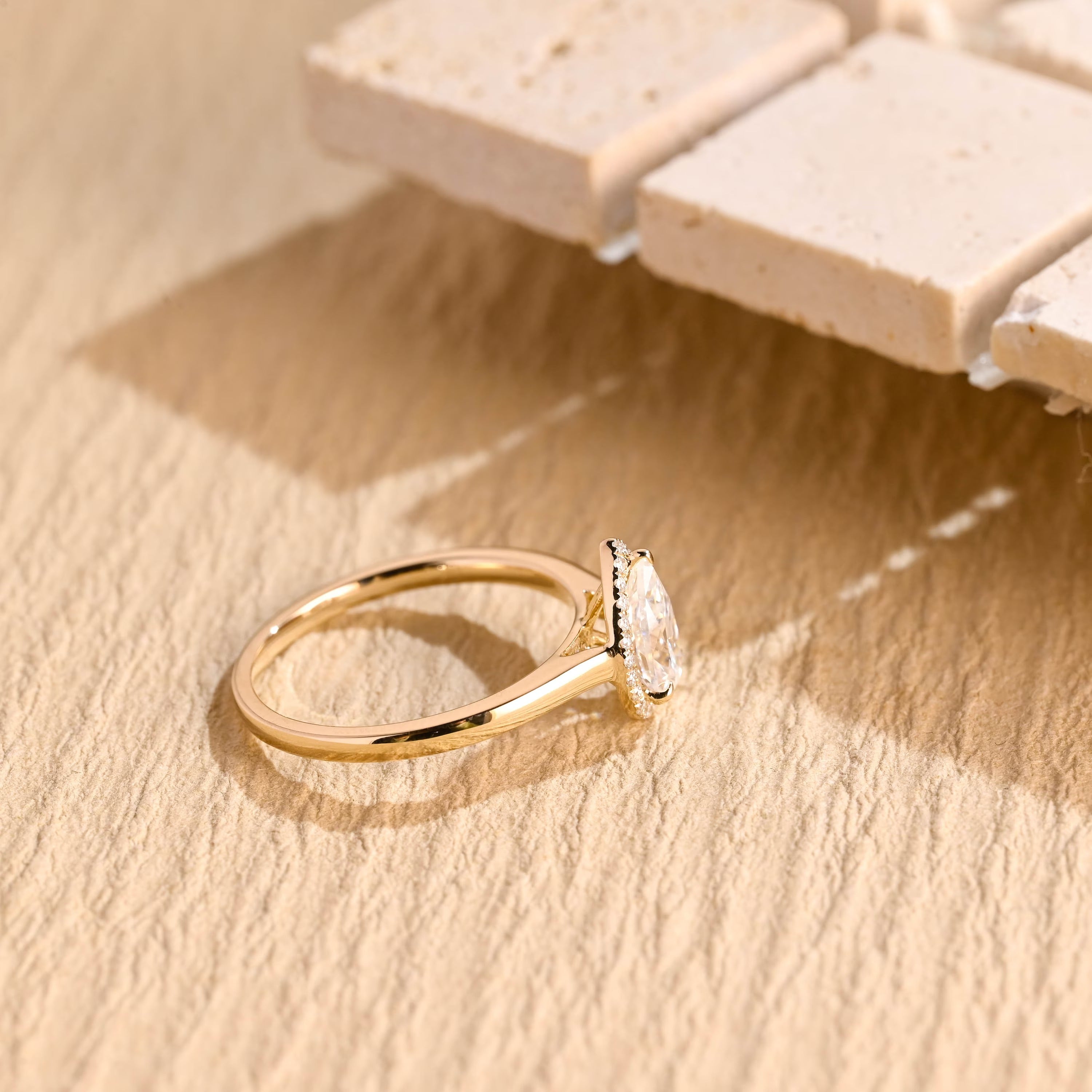 diamond halo pear moissanite engagement ring