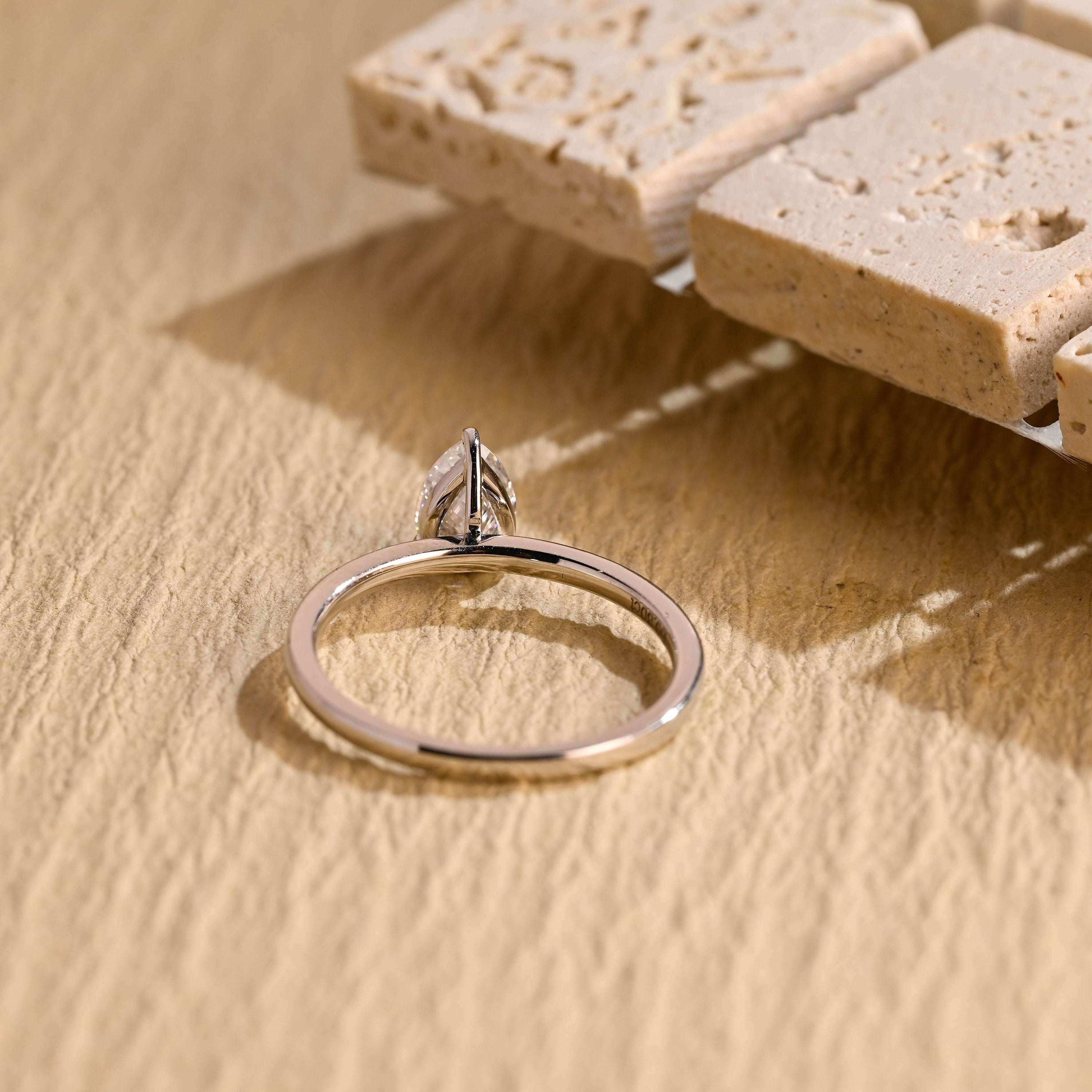 diamond alternative pear solitaire engagement ring
