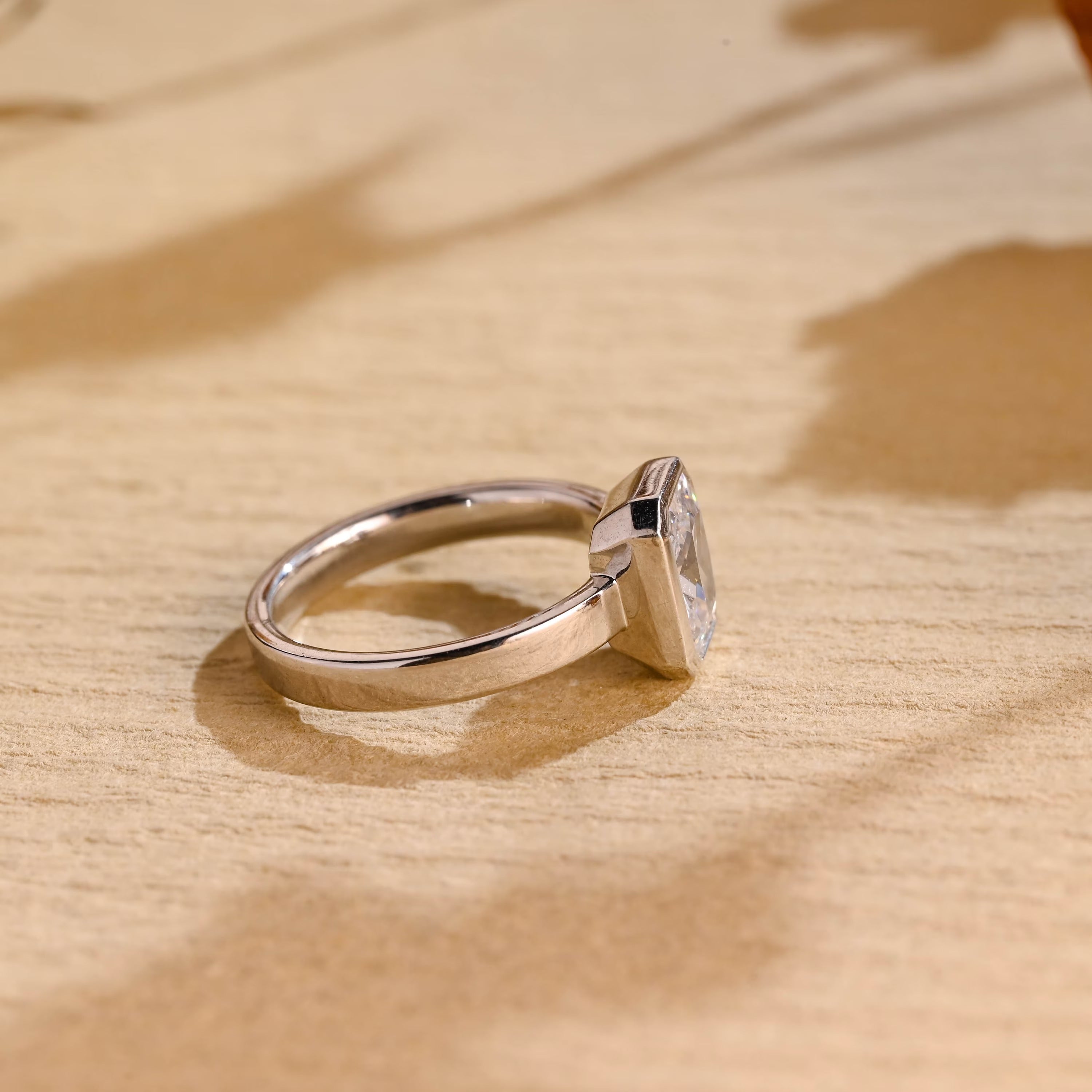 contemporary moissanite engagement ring bezel style