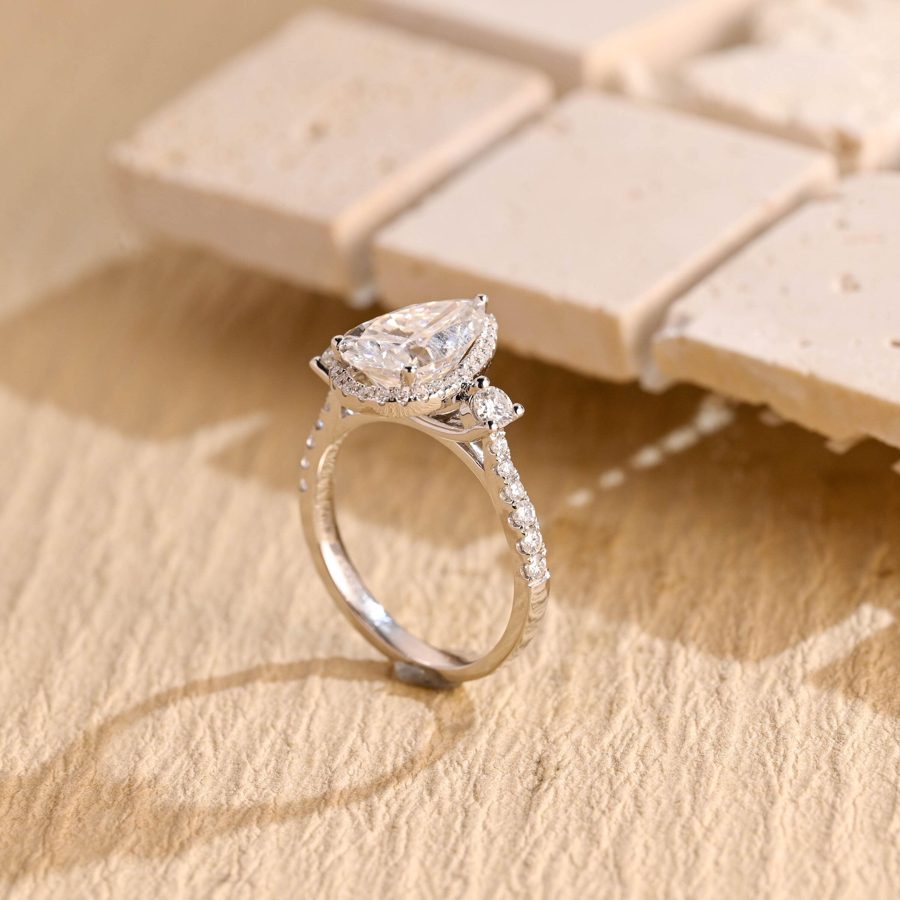 pear cut three stone lab grown engagement ring USA 56