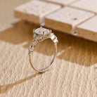radiant cut engagement ring cluster setting moissanite
