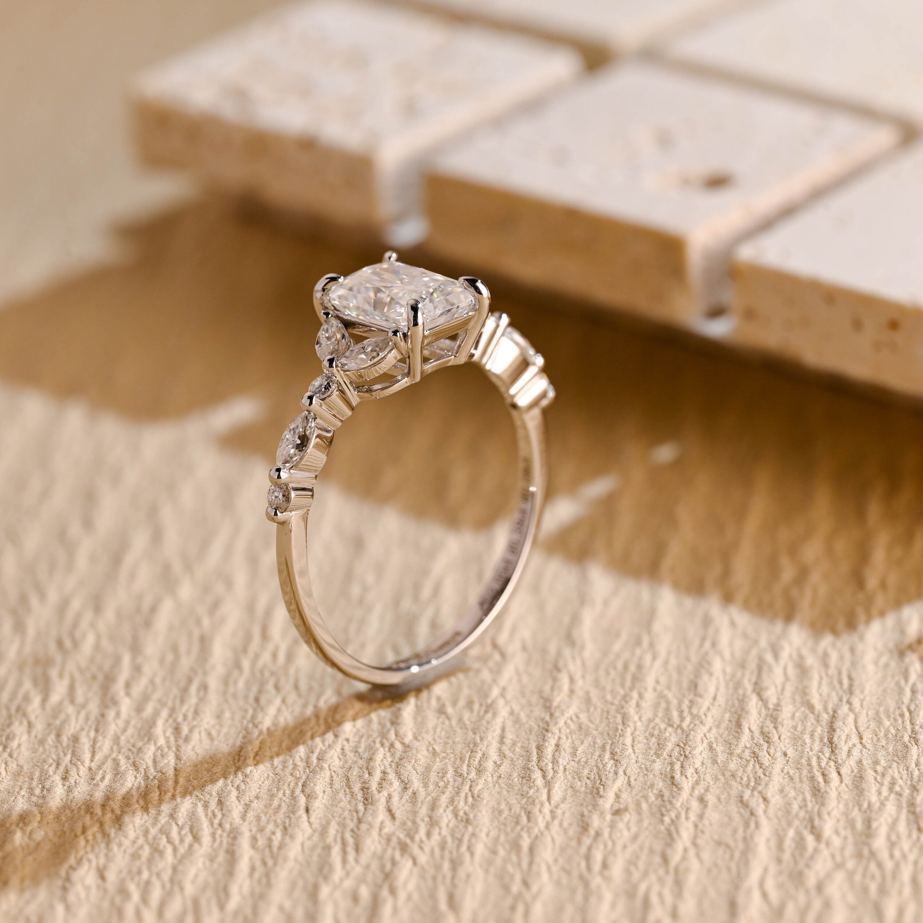 radiant cut engagement ring cluster setting moissanite