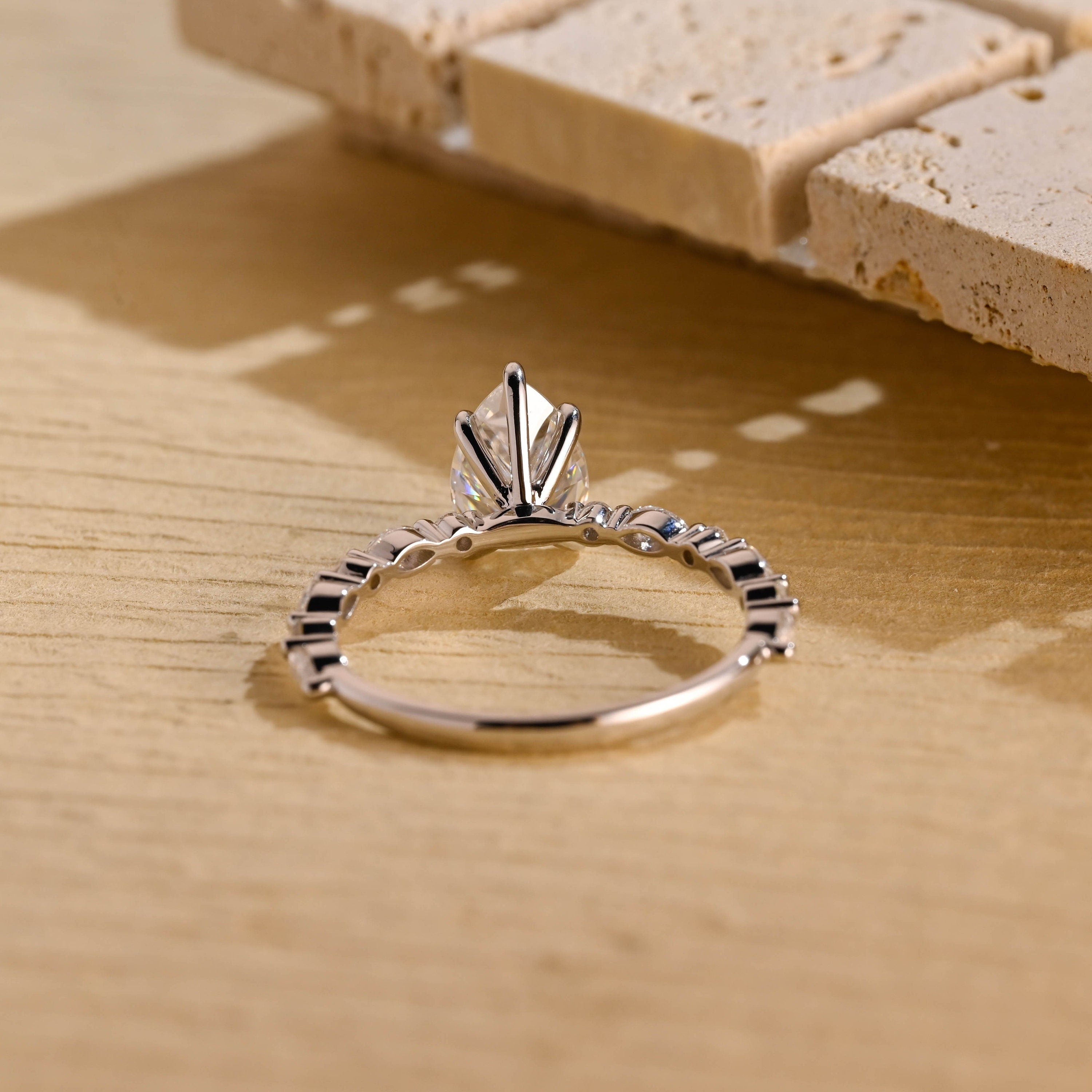 sustainable pear engagement ring moissanite