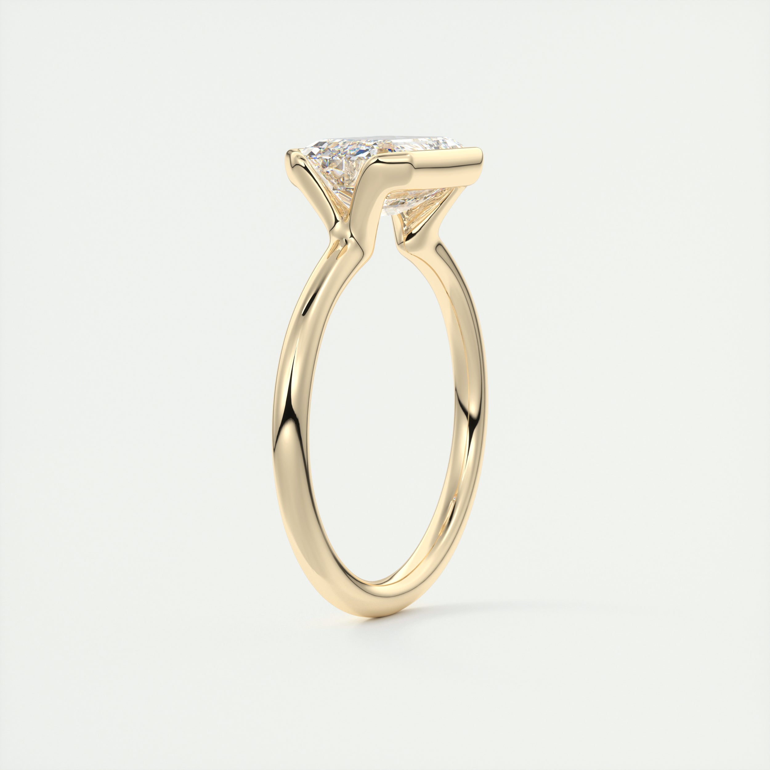 Solitaire Emerald Cut Ring