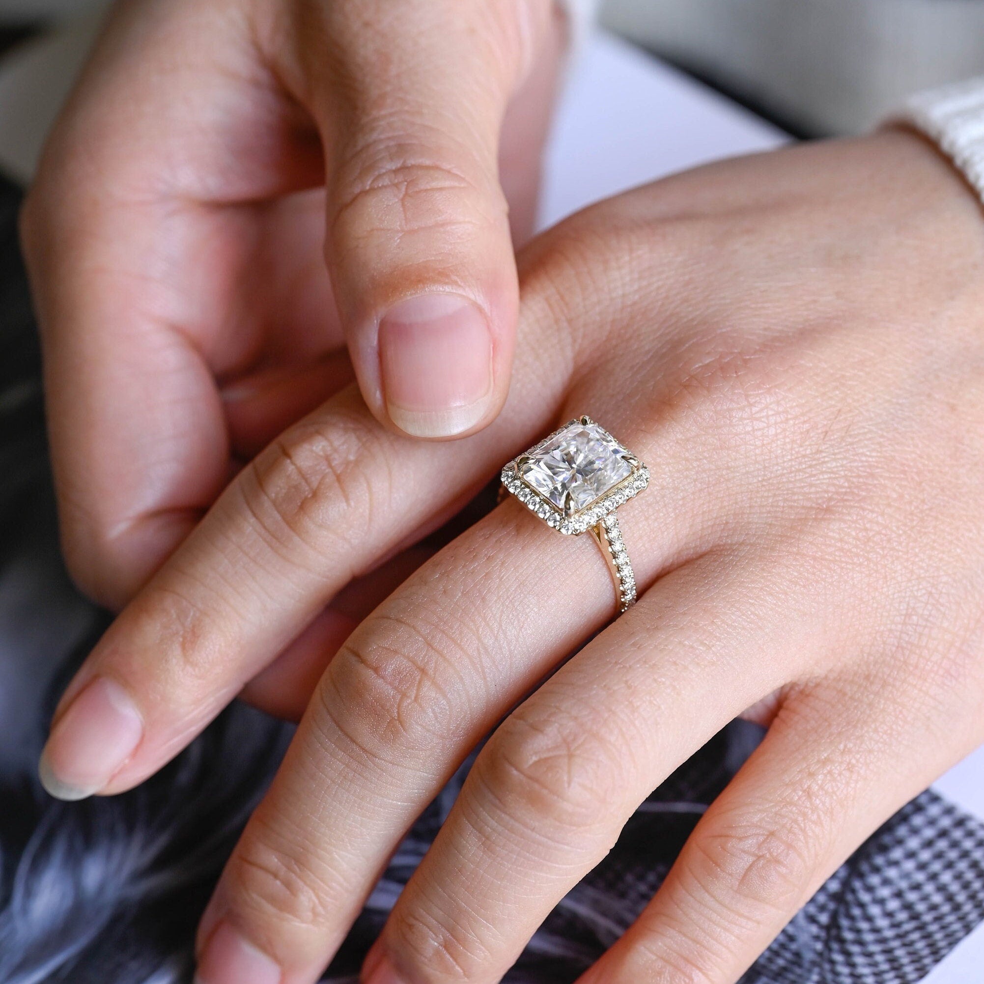 high sparkle radiant halo moissanite ring