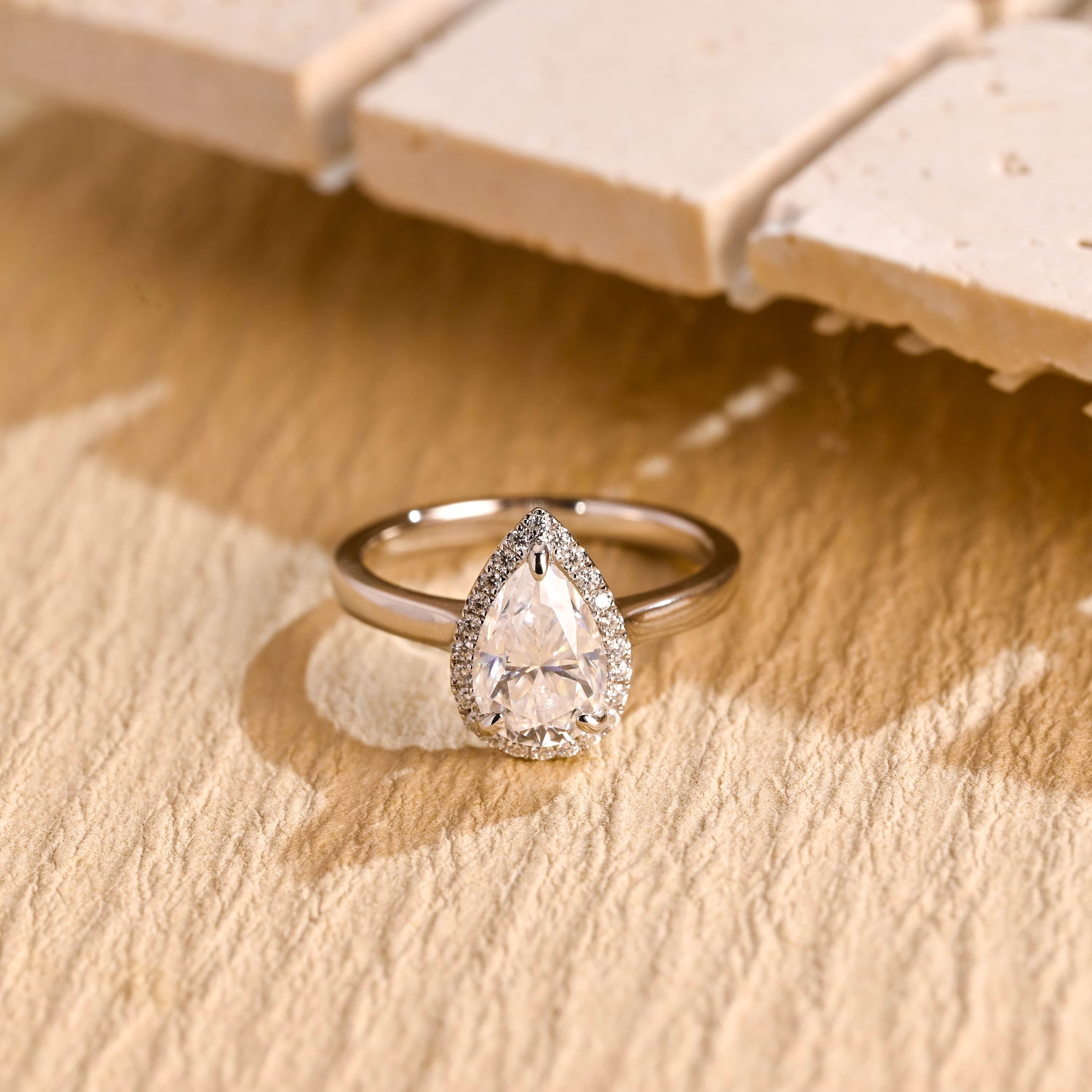 US bridal pear halo moissanite ring
