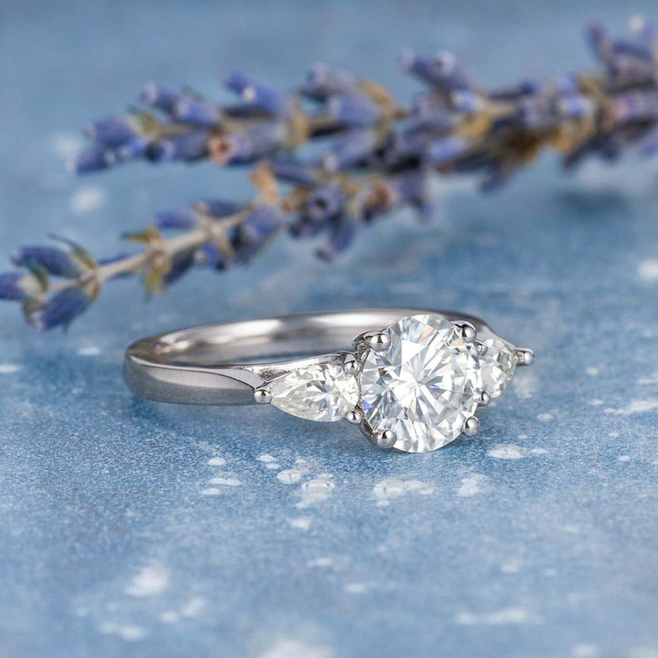 Round Brilliant Three Stone Ring