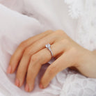 round-shaped-moissanite-three-stone-style-engagement-ring-5