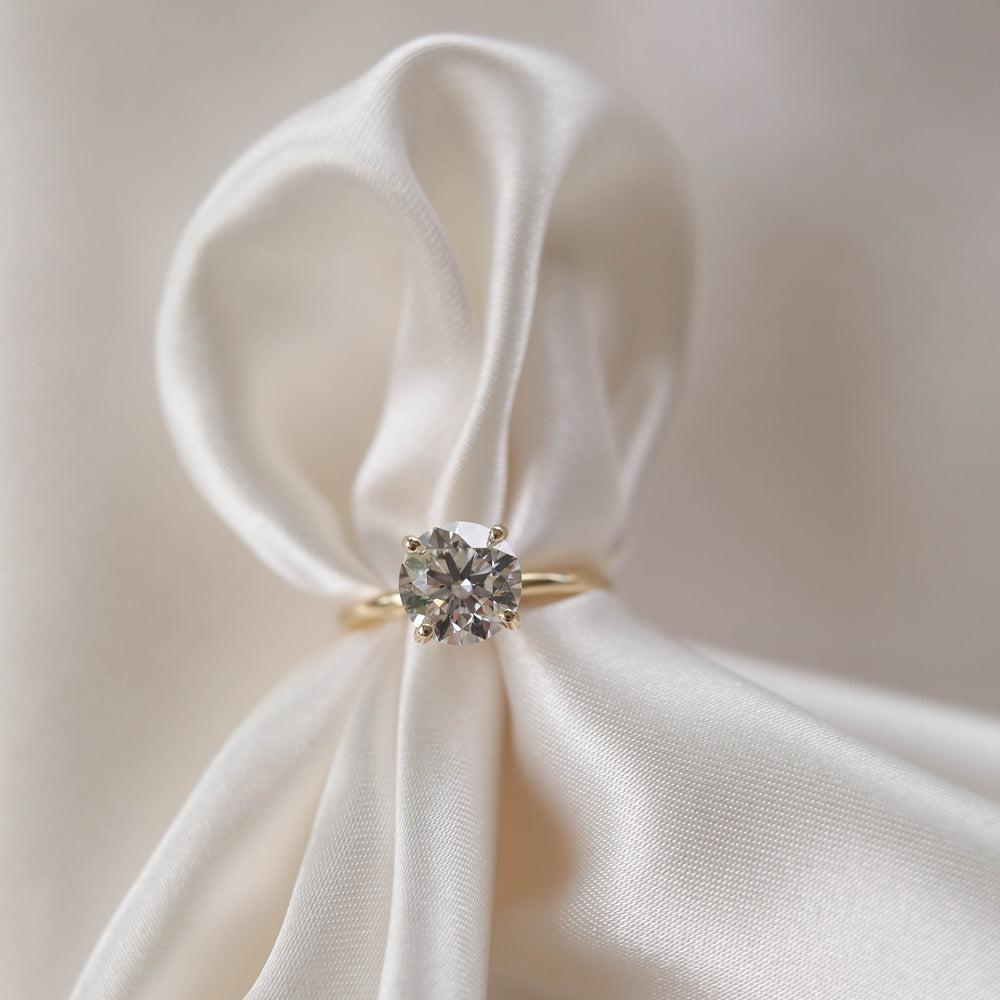 Round Moissanite Engagement Ring