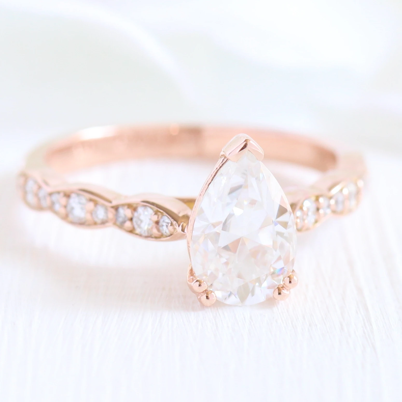 Solitaire Halo Moissanite Ring