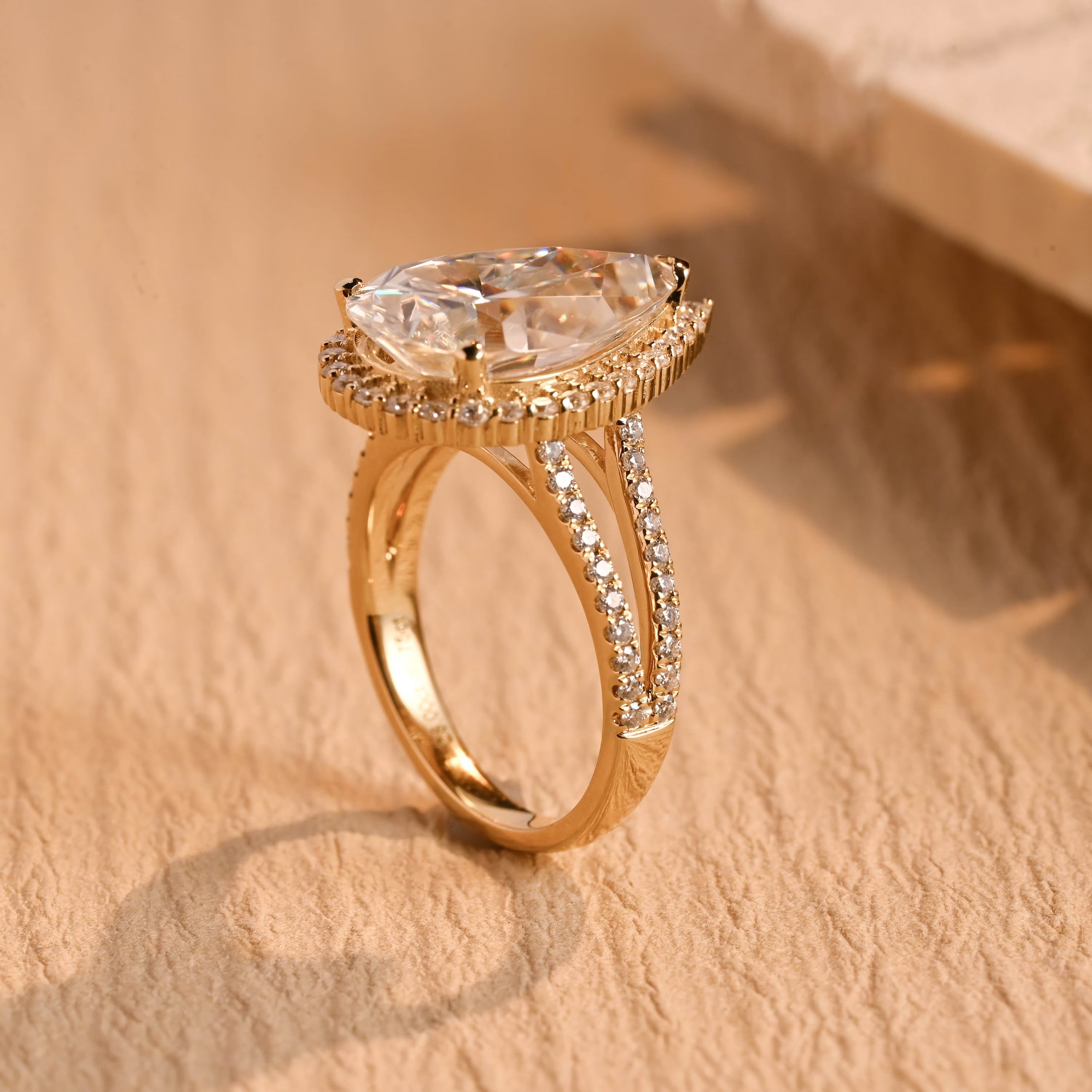 affordable luxury pear halo engagement ring