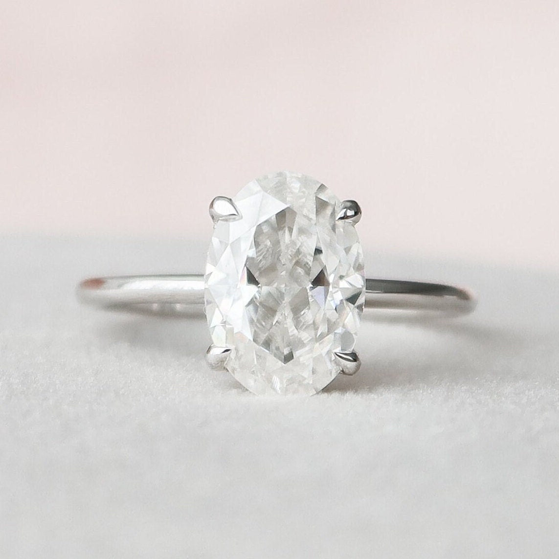 Hidden Halo Oval Ring
