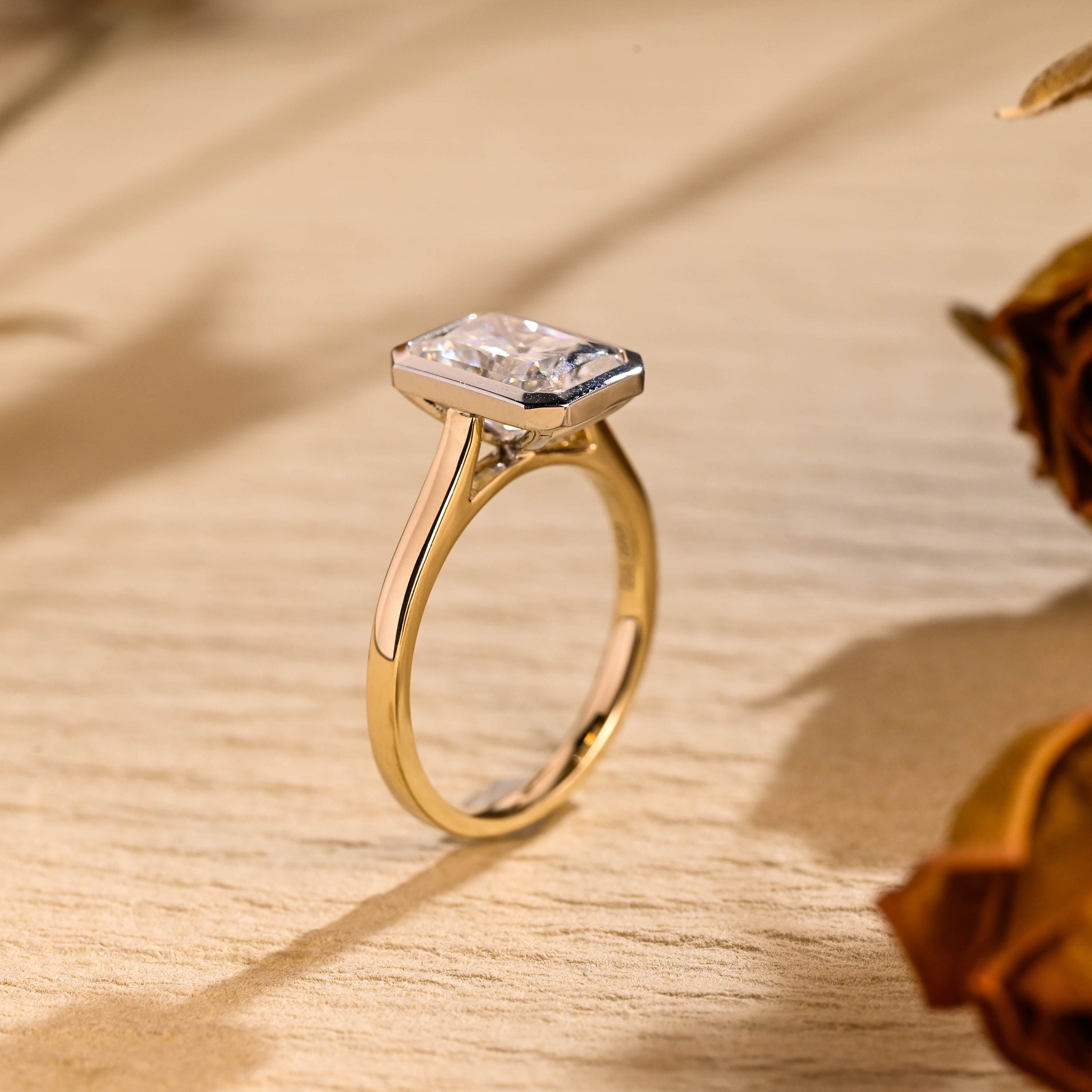 gold bezel moissanite engagement ring radiant cut