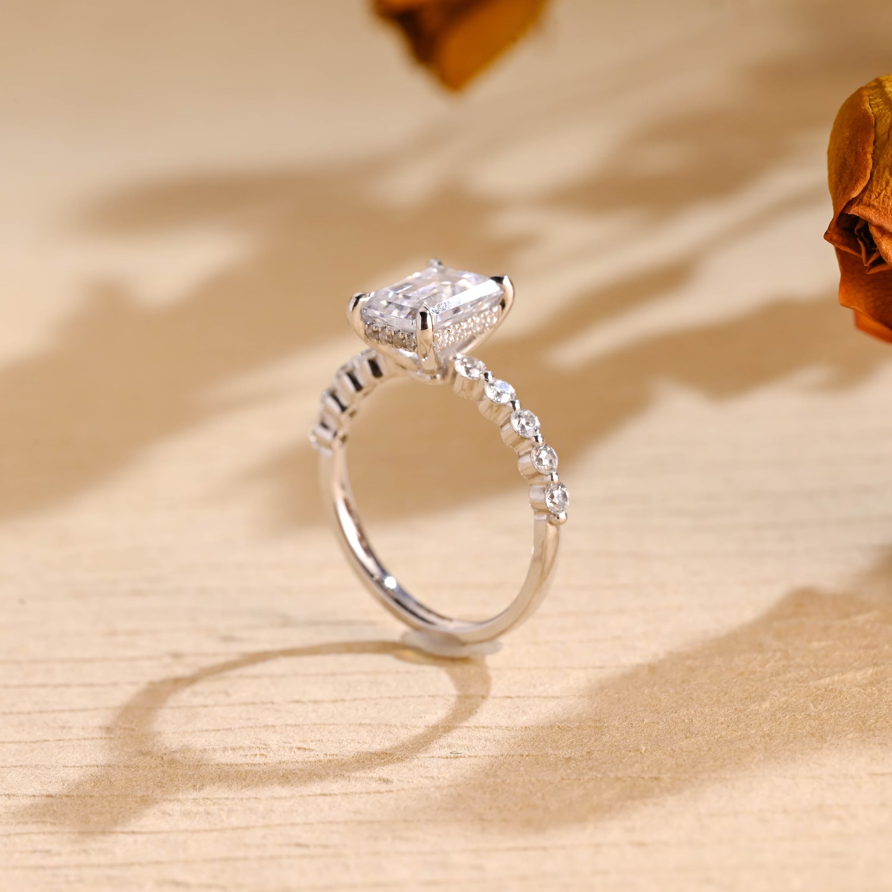 Sparkling Emerald Cut Moissanite Ring with Hidden Halo Setting