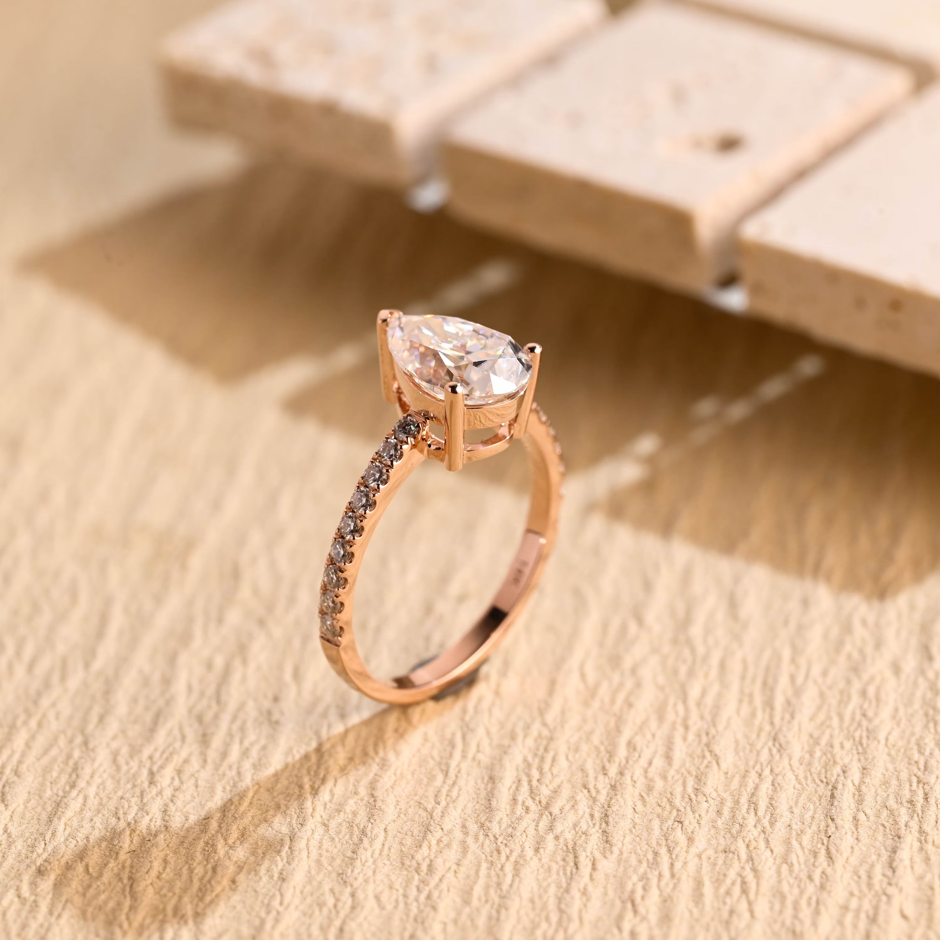 US bridal pear pavé engagement ring