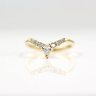 round-pear-cut-curved-moissanite-wedding-band