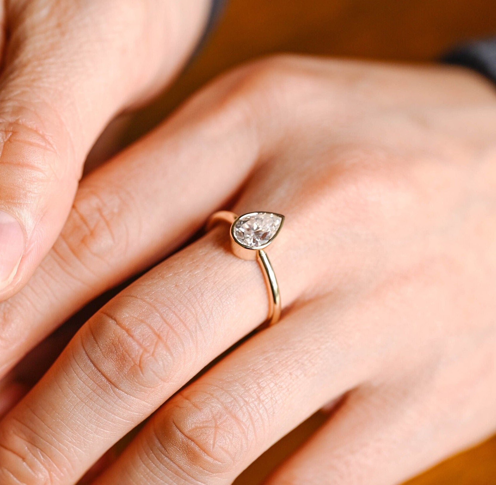 luxury pear bezel moissanite engagement ring