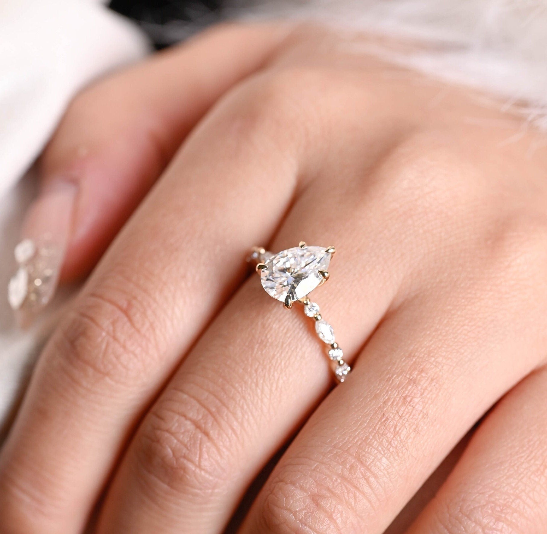 halo style pavé pear engagement ring alternative