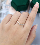 round-moissanite-curved-wedding-band