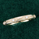 round-moissanite-vintage-style-wedding-band