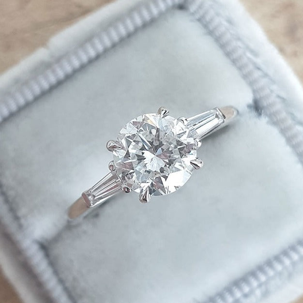 oval solitaire moissanite engagement ring