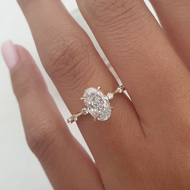 1.50ct Elongated Oval Four Prong Moissanite Diamond Petite Pave Engagement Ring